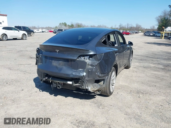2021 Tesla Model Y Long Range with VIN 5YJYGDEE4MF119249, listed as a IAAI auction lot 41764711 with 87,796 mi miles. Bid and sale history available at carsss.com. Image 4.