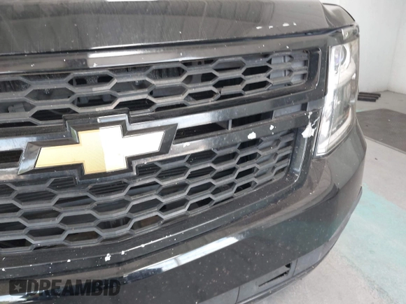 2015 Chevrolet Suburban LT with VIN 1GNSKJKC7FR199544, listed as a IAAI auction lot 42169017 with 219,219 mi miles and . Bid and sale history available at DreamBid. Image 6.