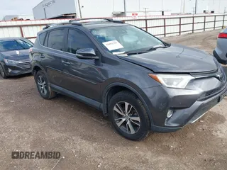 2018 Toyota RAV4 XLE with VIN 2T3WFREV4JW417555, listed as a IAAI auction lot 41092589 with 93,788 mi miles and . Bid and sale history available at DreamBid. Image 1.