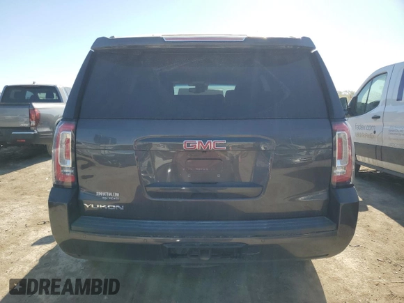 2015 GMC Yukon SLT z VIN 1GKS2BKC9FR147397, wystawiony jako Copart lot #53157845 z przebiegiem 131 552 mil mil oraz Szkoda całkowita • Salvage title. Historia ofert i sprzedaży dostępna na DreamBid. Obrazek 6.