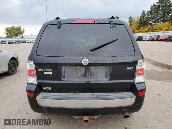 2009 Mercury Mariner Premier with VIN 4M2CU97G39KJ24297, listed as a Copart auction lot 77472674 with 153,316 mi miles and Salvage Title. Bid and sale history available at carsss.com. Image 6.