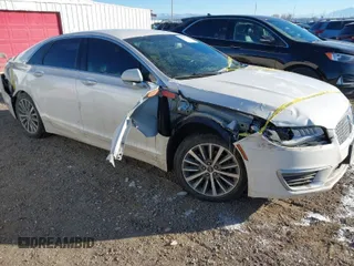 2017 Lincoln MKZ Select z VIN 3LN6L5D91HR657646, wystawiony jako IAAI lot #41330764 z przebiegiem 87 729 mil mil oraz . Historia ofert i sprzedaży dostępna na DreamBid. Obrazek 1.
