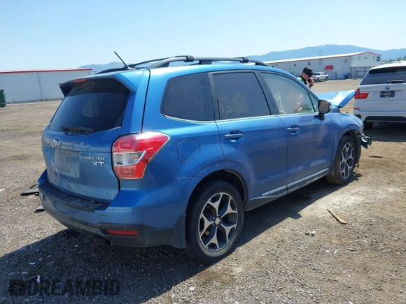 2015 Subaru Forester XT Touring with VIN JF2SJGWC7FH448103, listed as a IAAI auction lot 42182003 with 157,272 mi miles and . Bid and sale history available at DreamBid. Image 4.