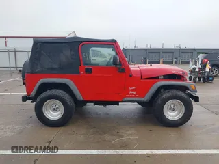 2006 Jeep Wrangler SE with VIN 1J4FA29156P762295, listed as a IAAI auction lot 41669950 with 163,492 mi miles and . Bid and sale history available at DreamBid. Image 13.