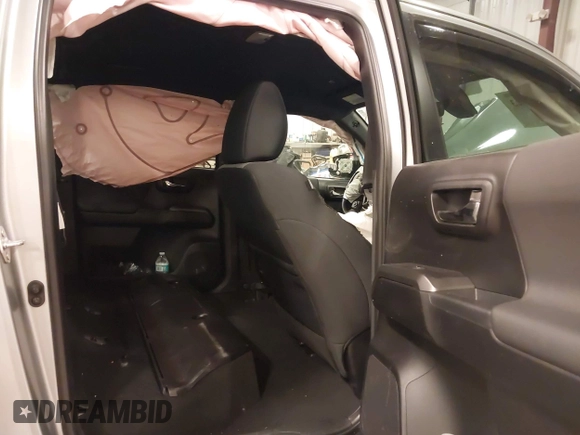 2023 Toyota Tacoma SR z VIN 3TMCZ5AN4PM597509, wystawiony jako IAAI lot #42020023 z przebiegiem 36 941 mil mil oraz . Historia ofert i sprzedaży dostępna na DreamBid. Obrazek 8.