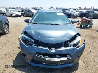2016 Toyota Corolla L with VIN 5YFBURHE4GP427800, listed as a IAAI auction lot 42182439 with 99,529 mi miles and . Bid and sale history available at DreamBid. Image 12.