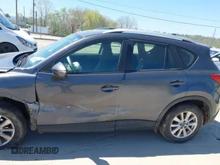 2016 Mazda CX-5 Sport with VIN JM3KE2BY2G0781565, listed as a IAAI auction lot 42042256 with 182,186 mi miles. Bid and sale history available at carsss.com. Image 15.