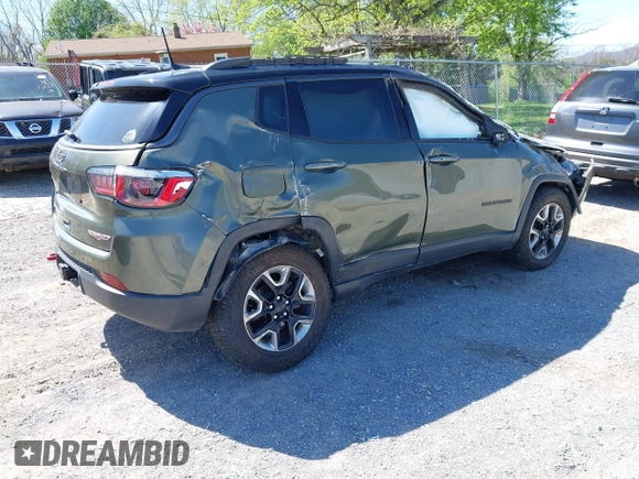 2018 Jeep Compass Trailhawk with VIN 3C4NJDDB0JT241163, listed as a IAAI auction lot 41986193 with 89,246 mi miles and . Bid and sale history available at DreamBid. Image 4.