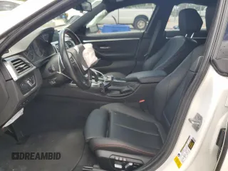 2021 BMW 4 Series 430i with VIN WBA4J1C57KBM15722, listed as a Copart auction lot 52690175 with 55,704 mi miles and Salvage Title. Bid and sale history available at DreamBid. Image 7.