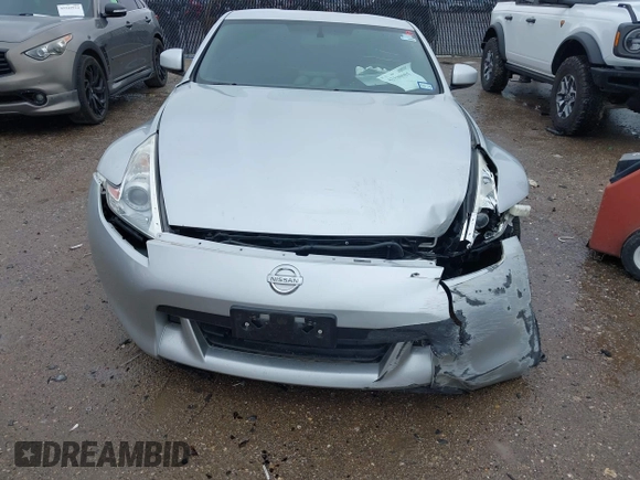 2010 Nissan 370Z Touring with VIN JN1AZ4EH9AM503264, listed as a IAAI auction lot 42180901 with Not provided miles and . Bid and sale history available at DreamBid. Image 12.