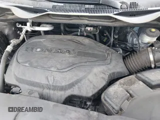 2022 Honda Odyssey Touring with VIN 5FNRL6H80NB023623, listed as a IAAI auction lot 41512586 with 63,329 mi miles and . Bid and sale history available at DreamBid. Image 10.