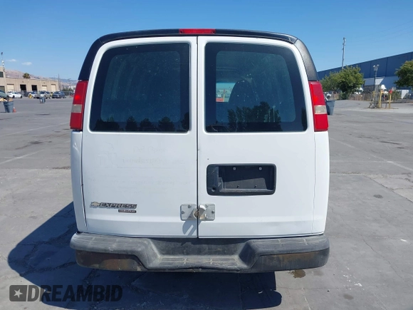 2014 Chevrolet Express Cargo with VIN 1GCSGAFXXE1200920, listed as a IAAI auction lot 42637911 with 205,182 mi miles and . Bid and sale history available at DreamBid. Image 16.