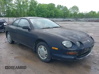 1995 Toyota Celica ST with VIN JT2AT00F7S0040443, listed as a IAAI auction lot 42125327 with 286,767 mi miles. Bid and sale history available at carsss.com. Image 1.