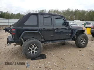 2021 Jeep Wrangler Unlimited Rubicon with VIN 1C4JJXFM0MW627692, listed as a Copart auction lot 43525105 with 102,472 mi miles and Salvage Title. Bid and sale history available at carsss.com. Image 3.