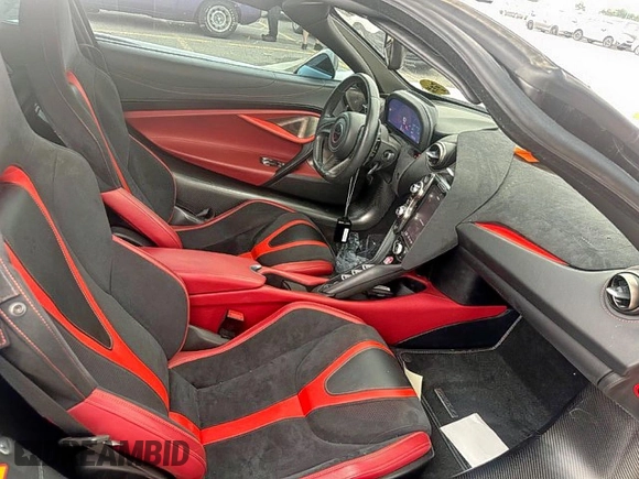 2018 McLaren 720S z VIN SBM14DCAXJW002364, wystawiony jako Copart lot #55175295 z przebiegiem 22 800 mil mil oraz Tytuł czysty. Historia ofert i sprzedaży dostępna na DreamBid. Obrazek 5.