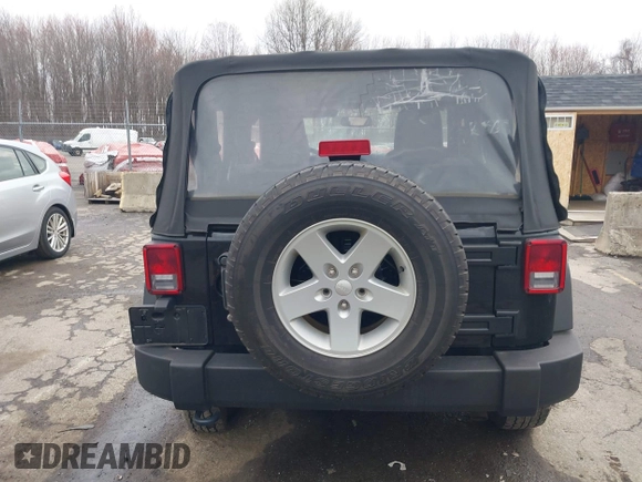 2014 Jeep Wrangler Sport with VIN 1C4AJWAG9EL312856, listed as a IAAI auction lot 42022870 with 98,323 mi miles and . Bid and sale history available at DreamBid. Image 16.