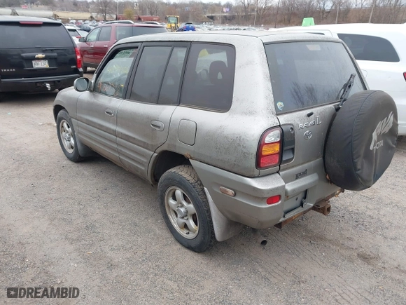 1999 Toyota RAV4 with VIN JT3HP10V8X7137998, listed as a IAAI auction lot 40954121 with 132,824 mi miles. Bid and sale history available at carsss.com. Image 3.
