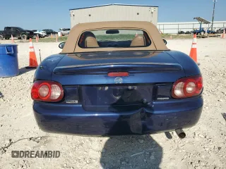 2002 Mazda MX-5 Miata Cloth z VIN JM1NB353720231873, wystawiony jako Copart lot #52398015 z przebiegiem 90 077 mil mil oraz Szkoda całkowita • Salvage title. Historia ofert i sprzedaży dostępna na DreamBid. Obrazek 6.