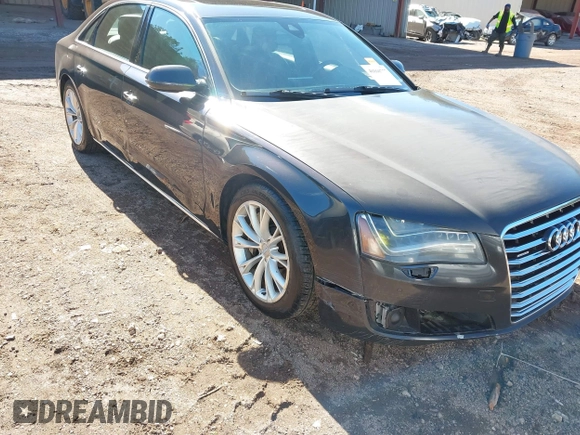 2011 Audi A8 with VIN WAURVAFDXBN014290, listed as a IAAI auction lot 40860777 with 152,584 mi miles and . Bid and sale history available at DreamBid. Image 6.