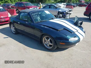 1996 Mazda MX-5 Miata z VIN JM1NA3533T0716564, wystawiony jako IAAI lot #42191052 z przebiegiem 101 713 mil mil oraz . Historia ofert i sprzedaży dostępna na DreamBid. Obrazek 1.