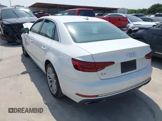 2019 Audi A4 Premium z VIN WAUGMAF48KN007428, wystawiony jako IAAI lot #42311766 z przebiegiem 65 249 mil mil oraz . Historia ofert i sprzedaży dostępna na DreamBid. Obrazek 3.