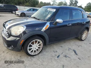 2011 MINI Countryman with VIN WMWZB3C59BWM00470, listed as a Copart auction lot 63830345 with 86,183 mi miles and Salvage title. Bid and sale history available at DreamBid. Image 1.
