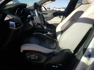 2019 Jaguar F-Pace S with VIN SADCM2FV1KA391631, listed as a Copart auction lot 87012144 with 73,021 mi miles and Salvage Title. Bid and sale history available at DreamBid. Image 7.