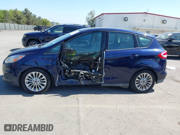 2017 Ford C-Max SE z VIN 1FADP5AU0HL115421, wystawiony jako IAAI lot #42216348 z przebiegiem 145 415 mil mil oraz . Historia ofert i sprzedaży dostępna na DreamBid. Obrazek 14.