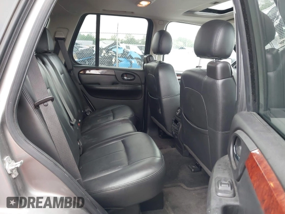 2008 GMC Envoy SLE2 with VIN 1GKDT13S482244279, listed as a IAAI auction lot 42144735 with 221,682 mi miles. Bid and sale history available at carsss.com. Image 8.