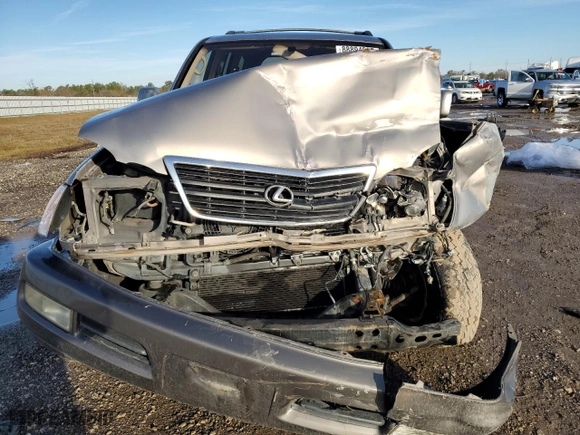 1999 Lexus LX 470 Luxury SUV with VIN JT6HT00W6X0067685, listed as a Copart auction lot 88894965 with 0 mi miles and Salvage Title. Bid and sale history available at carsss.com. Image 5.