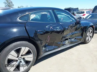 2023 Porsche Taycan z VIN WP0AA2Y19PSA14314, wystawiony jako IAAI lot #42207002 z przebiegiem 6582 mil mil oraz . Historia ofert i sprzedaży dostępna na DreamBid. Obrazek 6.