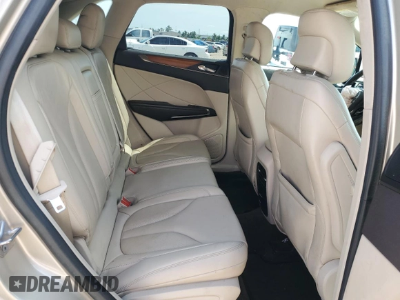 2017 Lincoln MKC Select z VIN 5LMCJ2C96HUL19657, wystawiony jako Copart lot #54157965 z przebiegiem 142 646 mil mil oraz Szkoda całkowita • Salvage title. Historia ofert i sprzedaży dostępna na DreamBid. Obrazek 11.
