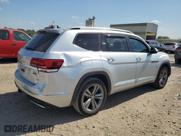 2018 Volkswagen Atlas SE с VIN 1V2PR2CA1JC579177, выставлен на аукционе Copart как лот 63792005 с пробегом 110 297 миль миль и Списание • Salvage title. История ставок и продаж доступна на DreamBid. Изображение 3.