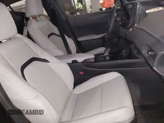 2025 Lexus UX with VIN JTHUCJDH8S2003698, listed as a IAAI auction lot 41368424 with 1,111 mi miles. Bid and sale history available at carsss.com. Image 8.