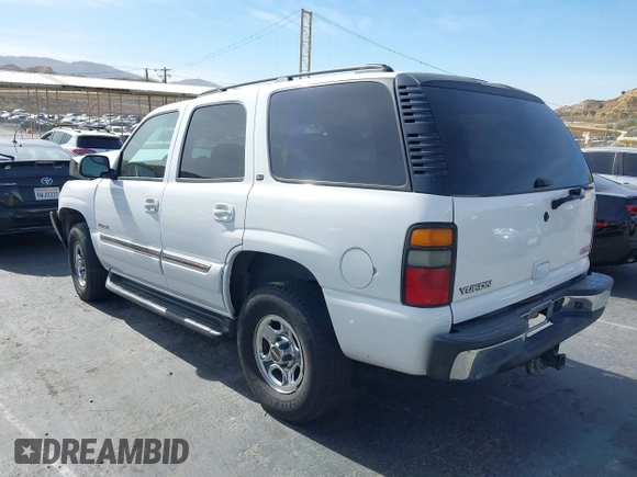 2005 GMC Yukon SLT z VIN 1GKEC13T05R273813, wystawiony jako IAAI lot #40796306 z przebiegiem 239 435 mil mil oraz . Historia ofert i sprzedaży dostępna na DreamBid. Obrazek 3.