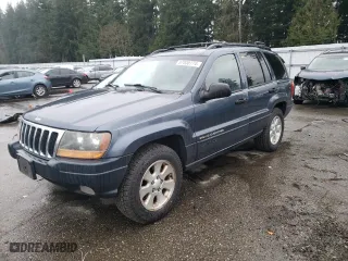 2001 Jeep Grand Cherokee Laredo with VIN 1J4GW48N91C560288, listed as a Copart auction lot 87030774 with 157,544 mi miles and Salvage Title. Bid and sale history available at carsss.com. Image 1.