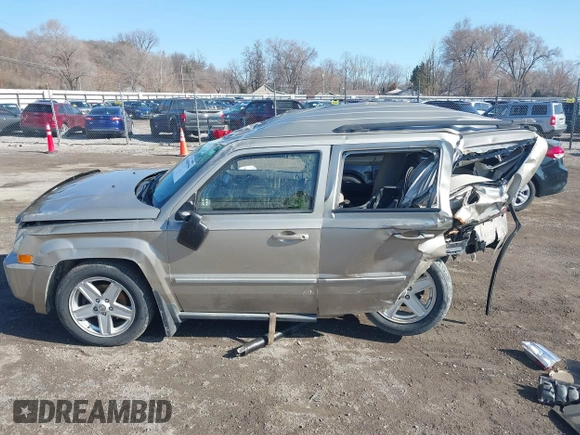 2010 Jeep Patriot Sport with VIN 1J4NF1GBXAD640562, listed as a IAAI auction lot 41869559 with 141,581 mi miles and . Bid and sale history available at DreamBid. Image 14.