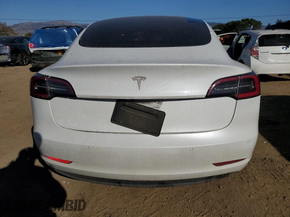 2021 Tesla Model 3 Standard Range Plus with VIN 5YJ3E1EA0MF017765, listed as a Copart auction lot 42776525 with 54,873 mi miles and Salvage Title. Bid and sale history available at carsss.com. Image 6.