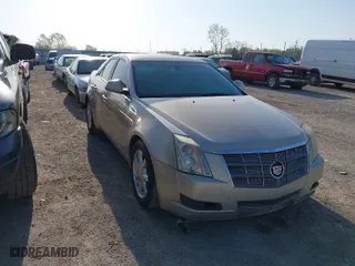 2009 Cadillac CTS RWD w/1SA with VIN 1G6DF577990141214, listed as a IAAI auction lot 42014205 with 237,986 mi miles. Bid and sale history available at carsss.com. Image 1.