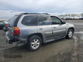 2005 GMC Envoy SLT with VIN 1GKDS13S852320018, listed as a Copart auction lot 80496544 with 237,451 mi miles and Salvage Title. Bid and sale history available at carsss.com. Image 3.