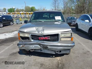 1999 GMC Suburban with VIN 3GKFK16R4XG514928, listed as a IAAI auction lot 41934636 with 245,010 mi miles and . Bid and sale history available at DreamBid. Image 12.