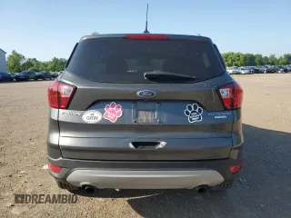 2019 Ford Escape Titanium with VIN 1FMCU0J96KUB22884, listed as a Copart auction lot 61979665 with 63,824 mi miles and Salvage title. Bid and sale history available at DreamBid. Image 6.