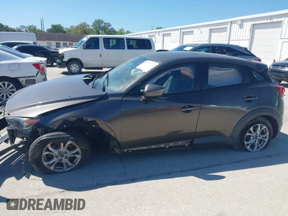 2016 Mazda CX-3 Touring with VIN JM1DKBC7XG0114940, listed as a IAAI auction lot 41777630 with 71,275 mi miles and . Bid and sale history available at DreamBid. Image 14.