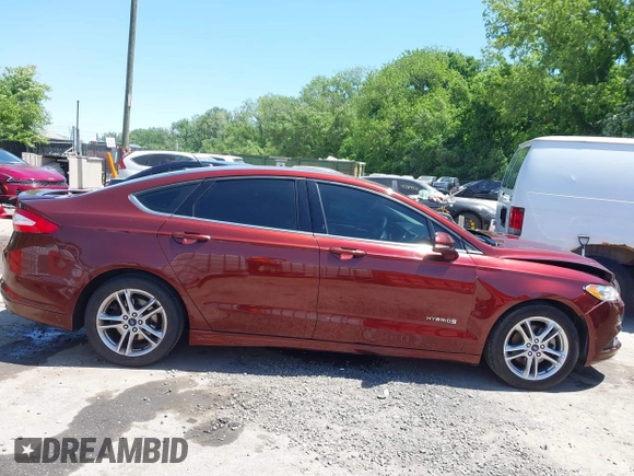 2016 Ford Fusion SE Hybrid with VIN 3FA6P0LU3GR143688, listed as a IAAI auction lot 42269789 with 163,910 mi miles and . Bid and sale history available at DreamBid. Image 13.
