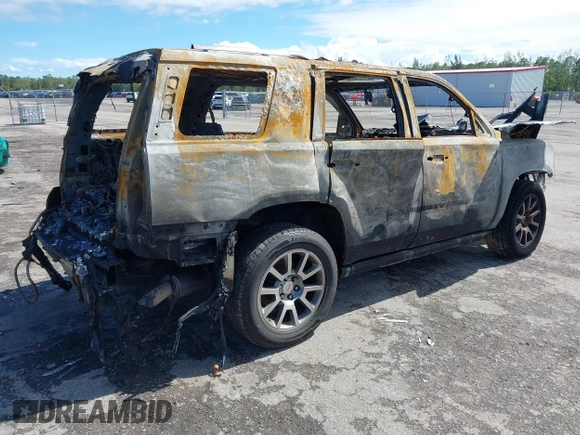 2015 GMC Yukon Denali with VIN 1GKS2CKJXFR655818, listed as a IAAI auction lot 41641960 with 1 mi miles. Bid and sale history available at carsss.com. Image 4.