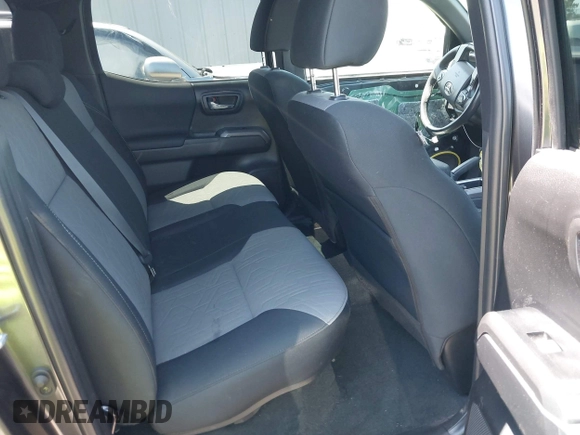 2023 Toyota Tacoma SR5 z VIN 3TMDZ5BN6PM153633, wystawiony jako IAAI lot #42353187 z przebiegiem 50 020 mil mil oraz . Historia ofert i sprzedaży dostępna na DreamBid. Obrazek 8.