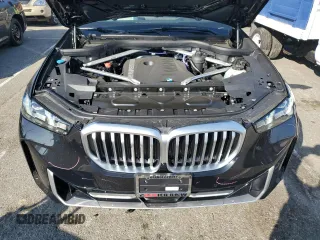 2025 BMW X5 sDrive40i with VIN 5UX13EU09S9Y23879, listed as a Copart auction lot 43774515 with 210 mi miles and Salvage Title. Bid and sale history available at carsss.com. Image 12.