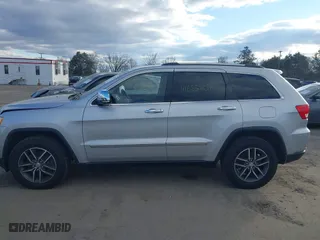 2011 Jeep Grand Cherokee Limited with VIN 1J4RR5GT8BC527676, listed as a IAAI auction lot 41683807 with 101,324 mi miles. Bid and sale history available at carsss.com. Image 14.