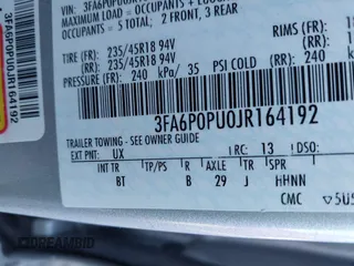2018 Ford Fusion Energi SE with VIN 3FA6P0PU0JR164192, listed as a IAAI auction lot 41821301 with 114,141 mi miles. Bid and sale history available at carsss.com. Image 9.