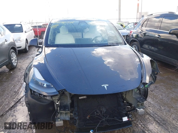2024 Tesla Model Y Long Range with VIN 7SAYGDEE0RA300064, listed as a IAAI auction lot 41640541 with 5,049 mi miles and . Bid and sale history available at DreamBid. Image 13.